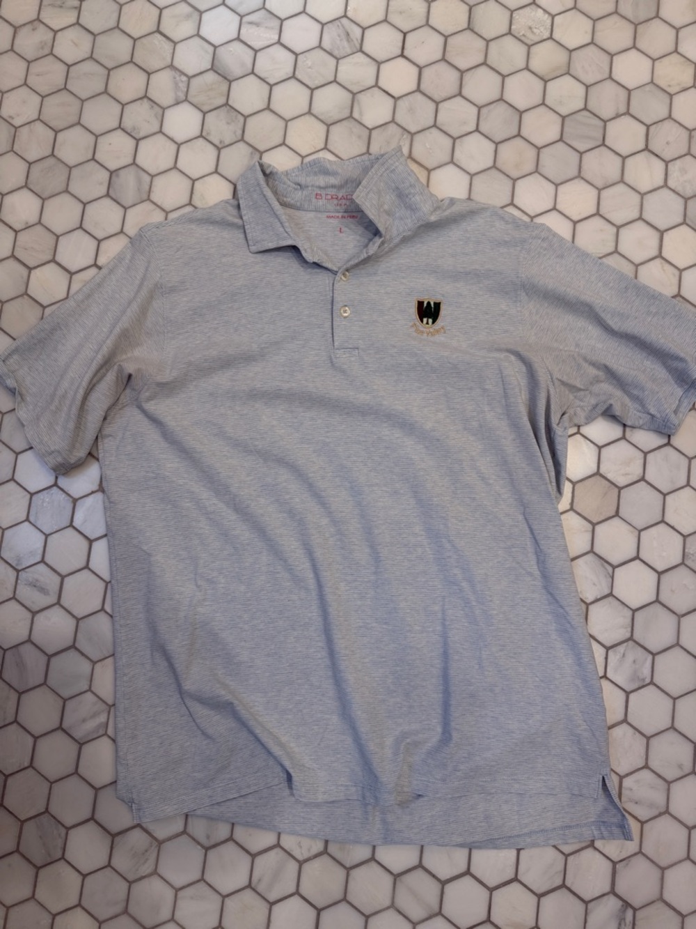 Light Blue Men’s Polo with Embroidered Crest